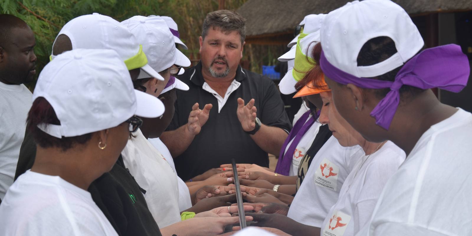 Mark Maguire facilitating a team challenge