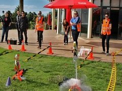 Teams preparing a bottle rocket launch