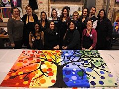 A team with its finished painted artwork